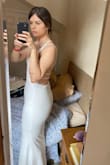 This fits me so well! It was stretchy on the hips which I appreciate because I don't have a ten inch difference between my hips and waist like almost all designers rely on to create bottoms.
It is super sexy and classy, and it is not transparent. FYI this dress is more of an ivory colour and not white. - Michelle D.