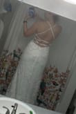 I really wanted this dress to work and ended up trying two sizes of it (pictured in size 10). Unfortunately, it just does not allow for hips. This dress was beautiful and a good quality but too small in the hips for me. - Rayna N.