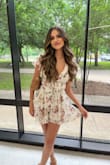 I wore this for a friend's graduation and it was SO flattering I got so many compliments on it! 
It does run slightly large and I had to use double-sided tape to keep the shoulders from falling off but otherwise the perfect romper. I'm wearing an XS! - Brianne H.