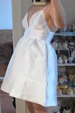 The quality of this dress is really good and it looks exactly like the listing! XS is a tiny bit tight on me just on the band area below the bust but it zipped up all the way and I prefer getting XS for most clothes due to my nonexistent chest. Straps are fully adjustable! - Annie T.