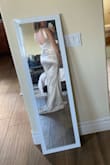 The top fits well, but tight around the tights. VERY stretch material, not much structure. Wanted it for my wedding, but just didn't fit my body type well and not as white as the picture shows! - Carinna D.