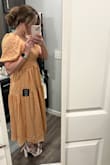 The filter on the model photos are quite deceiving. The actual dress is much, much brighter. It's still very pretty and worth keeping, just not the expected color. The dress is large and long on me (5'3), so I sized down, but still need to wear extra high heels. Overall, this is a beautiful spring dress. - Abbigal S.