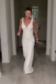 I can't say enough about this dress. It is simple, elegant and flattering. I DO have padded inserts in the bust because I'm flat chested. Also it is not very forgiving so I would recommend spanx. - Angela D.