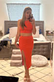 I love my one shoulder split midi dress, and thought this would be similar plus the orange is right on trend. I have a long torso, and I even found the pieces to be too close together. If I set the skirt at the smallest part of my waist, just above my belly button, then the top is too long and creates an unavoidable muffin top. I folded the top under to create more space and it looks better. Maybe it's just my body! - Jaime N.