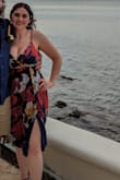 I wore this dress for a destination wedding and I loved it! I will say that if you are larger chested this dress may not work. I wore a sticky bra with this dress and it definitely showed a lot of cleavage. Overall super cute dress love the low slit on the side of the dress too! - Ashley S.