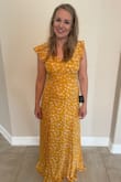 I bought several dresses for my graduation and ended up choosing this one. I got so many compliments. It runs true to size and is on the long side. I'm 5'6 and needed to wear heels. - Brenna B.