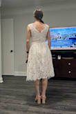 This dress is a classic bride outfit to wear to her bridal shower or rehearsal dinner! It is a perfect fit and the material is firm but breathable. Flattering and fun! - Lauren D.