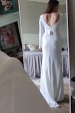 After seeing this dress I spontaneously ordered it 29 days before my wedding, crazy I know! I'm normally a medium but based on the review that a scoured before ordering I decided to size down and it was a good choice to order the small. It fits perfectly and is definitely long enough for my 5'10" frame. And as other people said you'll have to be mindful of any shapewear you have underneath because you will see lines because of the tight fitting quality. But I definitely don't think it's see-through! And I'm adding removal bra pads just to add a little extra support for my chest but it could definitely go without it. All in all it's a great quality material dress that comes at an amazing price! - Lydia N.