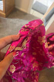 Bought this dress for a wedding. It fit a little loose and big but it worked. However, after only wearing it for 2 hours the dress ripped at the top seam even tho it got very loosely. There are also lots of loose string pulling. Very very disappointed in the quality especially for the price. - Jessica M.