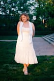 I loved this dress!! It's so pretty with the pattern and the length. Love for grad photos and graduation! - Courtney F.