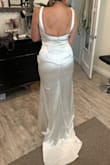 This is a very high quality dress. The material is thick, silky, and very comfortable. I loved the neckline and low back. - Lauren B.