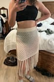 This item is so cute, but one of the fringe areas looks like it was burnt before it was packaged and shipped - Jasmine H.