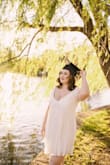 This dress worked out perfectly for graduation pictures! It's super flirty and flowy too! I was worried about sizing, but it fits perfectly for me. The only thing I will point out is that if you have a bigger bust to be aware that the dress is very busty and shows a bit of cleavage. I didn't mind it too much, but for graduation photos, I wanted a few more professional-looking pictures, so my photographer helped with that aspect. I also used fashion tape and a stick-on bra to keep everything in place, and it worked out fine! Overall I'm very pleased! - Aiden B.