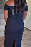 This dress looks great! The arms are a bit tight so you truly have to wear it off the shoulder. The only thing, my first dress had a stain on the rear, re-ordered it for an exact exchange. The second dress also had a stain! Not sure if i'm receiving returned dresses but I'm giving up and returning them both. - Adrian S.