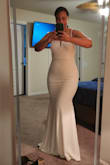 I bought this dress for my Caribbean elopement in July! I love it!! It fits great. Looks chic and sexy. Plus it's more than long enough for my 5'10 frame. The material isn't heavy but has substance (not cheap or see through). I tried on similar dresses at boutiques that were 4x the price. Definitely, a great price point for the quality. Dress has a subtle train which adds to the bridal feel. Highly recommend dress for a beach, micro or elopement wedding. Honestly, can be worn to any size wedding. I'm 5'10 and weigh 188lbs. ALSO, this dress can be worn with a strapless bra!! I have smaller chest and a padded bra works fine. If you have larger chest, there may be extra cleavage. - Maria T.