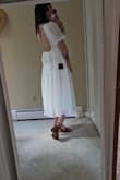 In searching for a dress to wear to my wedding welcome dinner I probably tried a dozen outfits. Feeling super exhausted and discouraged, I pulled the trigger on this one and it's absolutely perfect. Really nice material, super light, not see-through, and nicely customizable with the two tie points. So so happy I found this! - Erin R.