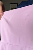 I got this in both tan and lilac. The tan one was great! I threw this lilac into my suitcase for a wedding and then noticed these streaks on them right before I was about to get dressed, what a bummer. Couldn't even wear it a single time. Thank goodness for backup dresses! - Vee B.
