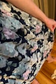 Sleeves fell down all night. It's very loose and flowy fitting but yet kind of short it's not the best.  Depending on the angle this dress can be flattering but my bf referred to it as the pregnancy dress =D - McChrista B.