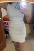 The dress came right on time for my graduation and I really liked it. I didn't realize how mesh the material was and thought it was kind of see-through, so I did buy a nude shapewear. Definitely wear a white/nude bra or strapless bra because any other colors will be visible as my dress was white. The fit was perfect for me and just had to be steamed before it was ready for my event. Lastly, the material was a little thinner than I imagined, but overall looked great! - Grace L.
