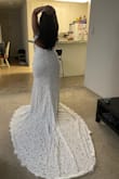 Bought this for my city hall wedding. I ordered a L and XL to compare. I kept the XL as it fit my bottom better and got the top altered to my size. Turned out to be the coolest dress ever! - Aneesha M.