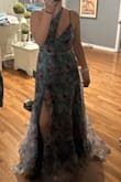I purchased this dress last minute for a wedding. I paid for expedited shipping, ordered on a Monday and was supposed to receive on that Thursday. Unfortunately the dress didnt arrive until Saturday so the alterations that I needed wouldn't be done in time. I am 5'1" and weigh 125#. I LOVED the back of this dress. Unfortunately, there was something weird happing with the fabric at the waistline. And because of my height, I felt like I would need the dresss taken up so it doesn't swallow me whole. Overall the dress is very pretty but I will be returning. - Karlie H.