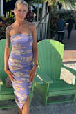 Dress fit well & has some stretch to it. I wore it to an outdoor summer wedding and it was breathable. I love the color options and pattern! It's a keeper :) - Brandy