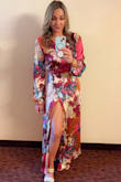 Beautiful dress, colors were amazing! I am pear shaped, small at the top and larger on bottom with athletic legs, I could have probably sized down but this size was very comfortable and lightweight. The slit was perfect! Wore to a spring wedding on a rainy day and it kept me warm but didn't get too hot dancing! - Tayler N.