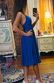 Fit perfectly. I ordered an xs ( my usual size) but I like a more snug fit. The pics are right out of the package, so the dress is a little wrinkly. I had it steamed at a dry cleaner before the event and it came out beautifully. - Elizabeth V.