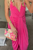 I ordered this bag to go with my hot pink dress & this bag MADE the whole outfit. I am OBSESSED with it! & it got so many compliments! It's sooooooo good!!!! - Savannah E.