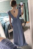 I love this dress so much! The material is light and comfortable and the fit is super flattering. I bought a handful of dresses to try for my sister's backyard wedding and while I didn't wear this one for the wedding, I am saving it for another occasion! Being able to comfortably move around in the dress was really important to me and I can easily do that in this dress, however, the sleeves regularly fell off my shoulders despite the grippy lining on the inside (think of the grippy strip in strapless bras). Can't have that happening, especially since it's dang near impossible to wear a bra with it. I am thinking I will wear this to my other sister's wedding next year but will have to get it hemmed and will probably try to use dress tape or maybe a thin fishing line in the back to keep the sleeves on my shoulders. Purchased XS and it fits really well otherwise!! - Grace W.