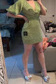 I've had my eye on this dress for a long time and FINALLY pulled the trigger as I'm in a bridal party for which each bridesmaid has been assigned a color - mine is green so at each wedding event I will wear a different green dress. I really love this dress. Small is true to size. A little on the short side, and I am short, but I also have hips so that doesn't help. As long as I'm careful I don't think I'll flash anyone... Otherwise, it's secure, decently made, and I'll probably wear pasties or some other creative bra to lift/secure since the back is open. It's flattering to my shape and I think it's unique overall. I can see how the glitter will fall off easily but that doesn't take away from my satisfaction with the dress. It's breathable and lightweight. I'm glad I bought it, worth the price and I don't have anything else like it. - Katherine Y.