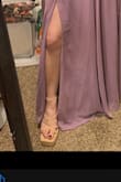 The quality was not impressive. I'm very sensitive to small details & I saw a small spot of excess glue & the straps were tight across the foot & not tight enough at the ankles. Latter ignored tho bc my ankles are quite skinny & bony.

They were okay to walk in, my foot didn't feel secure in that I could feel gravity pulling the shoe away from my heel when I lifted to step. I think it comes w/ the territory of chunky straps heels. However, I could feel a little friction at points around the ankle & my pinky toe on only one foot slipped out of the strap after walking.
Ultimately I returned them bc I needed a different height heel for my bridesmaid's dress, but I would have made them work out of laziness.
TL;DR 
quality 3.5/5
comfort (at try-on) 3/5
fit 3/5 just half a size too large
Only flattering on cute feet that aren't pointed like mine - Kathryn T.
