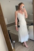 I'm typically not a dress gal due to my large hips and small bust but this dress is stunning. The cinching across the stomach really accentuates the waist! 10/10 recommend - Madi K.