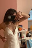 Reviews said that it runs small so I WAS CONFIDENT in ordering a S. Pretty sure if I ordered a XS it would've fit. The bust was way too big for me, prob because I have small boobs. The picture is the dress right out of the packaging, so all I would need to do is steam/iron it. AGAIN if I ordered XS the waist would've fit. - Mad O.