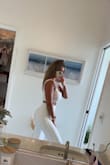This pant and top set are so cute! I got a lot of compliments on it! It also fits so well, and the quality is amazing! Not see-through at all. I got soaked in a Florida rainstorm running into the restaurant and it wasn't see-through like many white outfits would be. I'm 5'5" so the pants are a little long, but perfect length with heels! - Emily F.