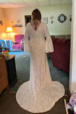 My husband and I are renewing our vows in April 2024 at our favorite beach in Florida. I had purchased at very simple dress Ana then saw this one and fell in love wit it. I have lost 50 lbs and just was not sure if the sizing. I started out with a XL then a 1XL both would not zip up the back. When I got the 2XL it fit perfect! The company is great with the returns!! So happy the last one fits!! (Also my face looks awful& I was trying to get my 82 year old mother to take the pict on a phone she does not know how to work. ># - Kelly C.