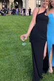 I wore this to a black-tie wedding and absolutely loved it. With the one strap over my neck, I didn't have to worry about it falling down and constantly lifting it like I would if I wore a strapless. It's snug all over but not restricting because of the sexy slit up the leg! Will definitely be wearing it again because of its universality. - Adeline R.