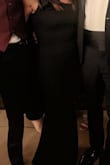 The fit of this dress was perfect! It has some stretch to it so it was amazingly comfortable! I received several compliments! I did have to get it hemmed like an inch, but the fit everywhere else was perfect! - DeeAnn M.