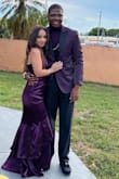 I wore this dress to prom and let me tell you, me and my man were looking so fine and ever-so fly. The color ended up being a perfect match to his suit. The slit was flattering but not too high up on my leg, the train was manageable I just had the bad luck of dummies around me. The material was so smooth and the light bounced off so perfect that it made the color look even richer. It was a bit loose however I blame the primary layer of the dress since it isn't meant to stick to the body like the underdress. Thankfully, the dress has adjustable straps but BE AWARE OF HOW TIGHT YOU HAVE THEM WHEN SITTING DOWN AND HAVING A HEAVY BOTTOM. I have a butt so when I went to sit in my passenger seat toward the end of the night the straps did bust out their seams. DO NOT LET THIS DISCOURAGE YOU FROM THE DRESS, Just keep in mind if you choose to tighten it!! Overall, I give it a good 9/10. Beautiful dress, amazing material, and arrived no less than a week later!! - Alina R.