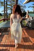 This dress was so pretty and was the perfect fit! I bought it as a bridesmaids dress (the bride suggested it) but it ended up not being the right color. I would say it was more like an off-white, not champaign. Other than that it was lovely! - Victoria A.