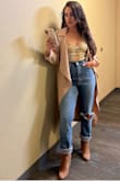 I wore this during the fall and paired it with booties and a long coat. I received so many compliments. I can't wait to transition this top in the spring. For reference, I have small boobs and the top half fit just right. - Rocio Z.