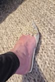 To short.my heel comes over back of shoe - Joanne N.