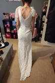 This was the first dress I bought and instantly knew it was perfect for my wedding. It doesn't even need alterations. The quality is great and looks way more expensive than it is. It is a tiny bit long, but with heels it is the perfect length. - Shari R.