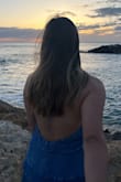 Love this dress! it photographed well. The backless design made the top a little loose. I wasn't necessarily worried about my boob popping out but I definitely noticed that I wished it were tighter - Clarice A.