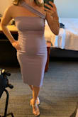 This was a perfect wedding guest dress for a spring/summer wedding. The fit was great and so comfortable even being 26 weeks pregnant (125lbs). I ordered my pre-pregnancy size (small) and there was enough stretch in the material to still fit around my bump. I probably could have gone up a size to a medium but then it may have been too long or too big in the bust/strap area. Like other reviews, the zipper was a little tough to pull up and the strap was a little too big, but didn't affect how much I loved the dress and look. I just tucked the extra strap in the back of the dress. - Brittany S.