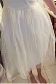 Fabric is terrible and so uncomfortable. The way the one shoulder is cut looks terrible. Just look at the rough tulle of this skirt! It's funny because the individual packing for this dress says "quality fabric" which it definitely is not.
The middle was so scratchy on the inside. I'd expect this quality from a $15 dress. Honestly, I was a bit baffled by how bad it was lol - Annika H.
