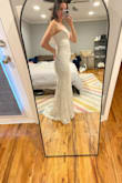 This dress is so perfect - simple, yet elegant. I originally ordered a small because every other size Small dress I tried from Lulu's fit perfectly, but this one I couldn't zip up in the back so I had to size up to a medium. I love how this fits. The only other thing I noticed is that the straps on the model are much further out than how they appear in person, so I may get them taken out a bit. They seem a little awkwardly too far in, but otherwise, I love it! - Allison G.
