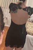 I was looking for a dress to wear to my cousin's wedding and really wanted something appropriate (we have a small family so I am one of 3 that is going) but still my style. When I found this dress I knew it was the right one! Love the open back and the thick material. - Roxanne L.
