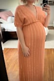 Ordered this for my baby shower as I was looking for something I wouldn't have to alter the length. This fit me perfectly upon arrival so if you are taller than 5'3" it is probably too short for you (would be even better for someone around 5'1"). Giving it four stars because it smelled very badly of chemicals and I had to wash it which made it shrink slightly even with air drying. Had to use some fashion tape for the deep v-neck.
All in all very happy with this purchase and looking forward to wearing it post-pregnancy as well! - Kayla S.