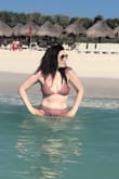 The fabric in this suit is so soft and is high quality. Also, the high waist fit hid my stretch makes and made me feel comfortable and sexy. - Julia B.